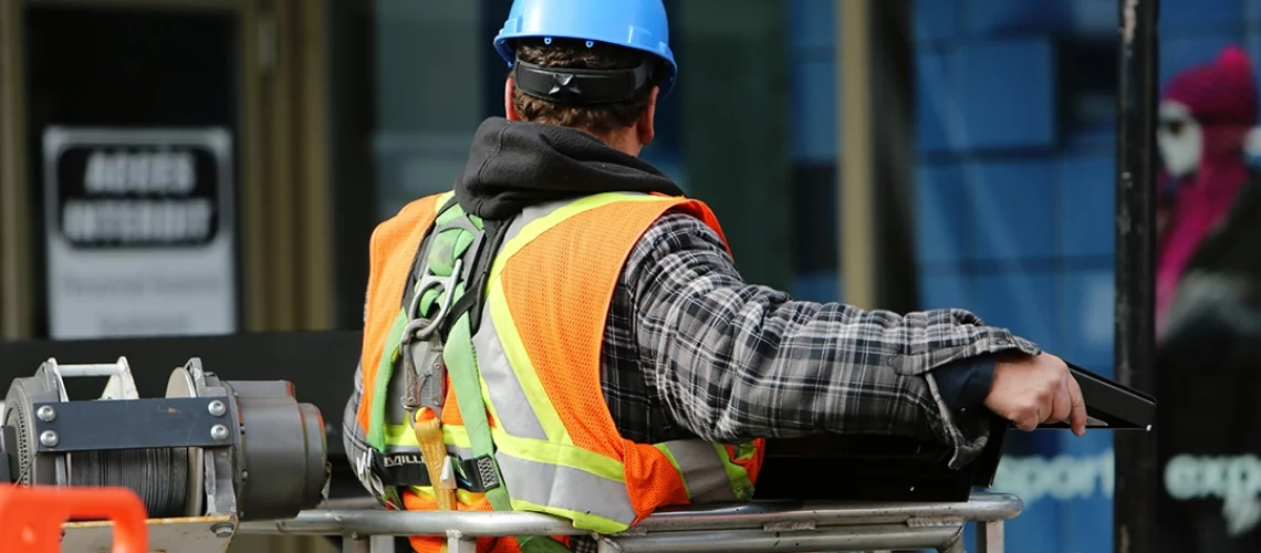 contruction worker wearing personal protective equipment