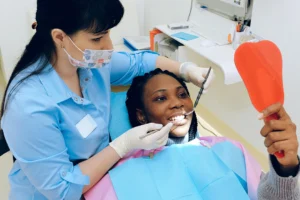 woman smiling at the dentist